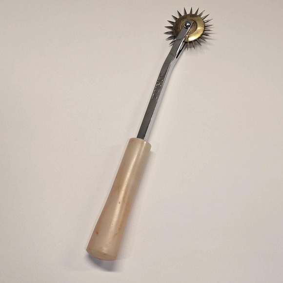 Dritz Other - Vintage Dritz Tracing Wheel Perforating Cut Tool Pink Bakelite Handle 6" Japan